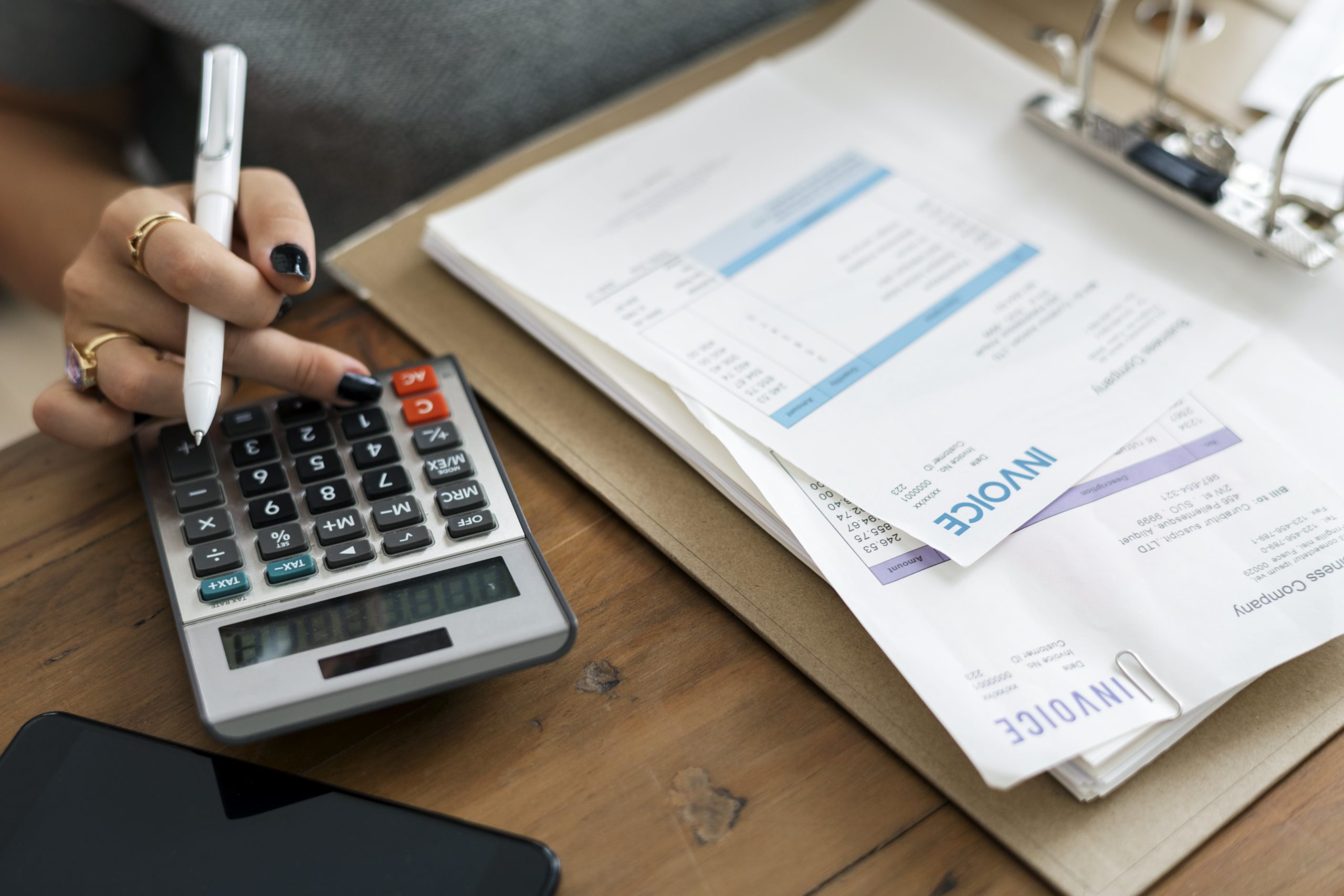 woman calculating rising energy costs